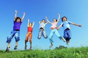 Optimized-Five happy children jumping outdoors What are the Autism Spectrum Disorders?